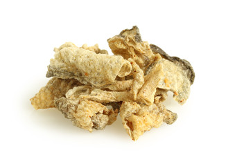 Crispy fried salmon skin on white background