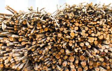 Background of many small pieces of wood pile row