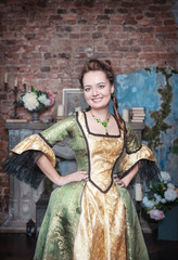 Smiling beautiful woman in medieval dress