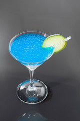 Cocktail with blue caracao caviar