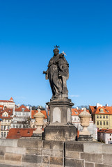 Fototapeta na wymiar Sculpture on Charles bridge in Prague, Czech Republic
