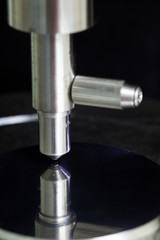Indenter of rockwell scale c testing with calibration block