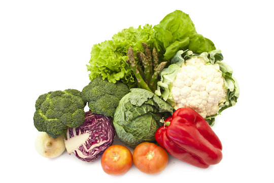 group of fresh vegetables isolated on white background