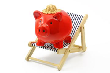 sparschwein mit sonnenliege