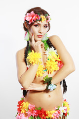Fototapeta na wymiar girl with Hawaiian accessories think