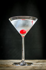 Martini cocktail with maraschino cherry