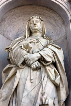Detail of a stone statue of a saint