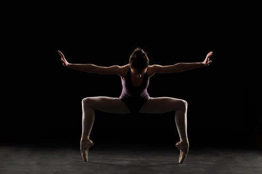 Silhouette Ballet Dancer In Black Swimsuit