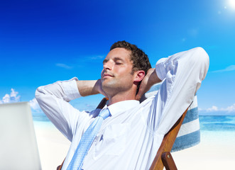 Businessman Relaxing on the Beach
