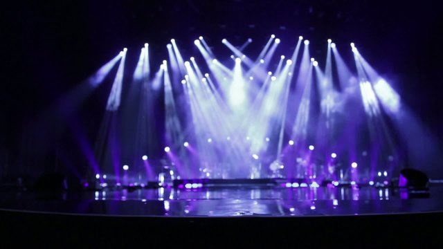 Empty Stage at Concert with white and blue spotlights
