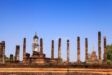 Fototapeta na wymiar Ancient buddha statue. Sukhothai Historical Park,Thailand