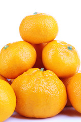Ripe sweet tangerines, isolated on white