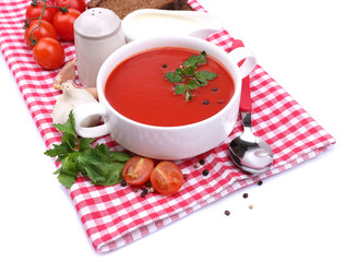 Tasty tomato soup and vegetables, isolated on white