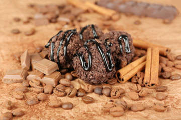 Delicious chocolates on table close-up