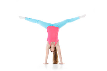 young woman doing gymnastic exercises