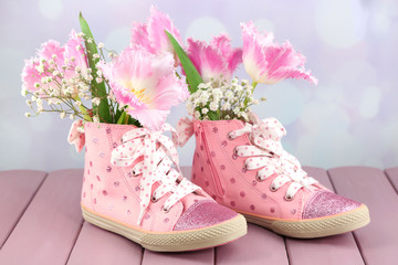 Beautiful gumshoes with flowers inside
