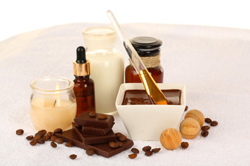 Beautiful chocolate spa setting on towel close-up