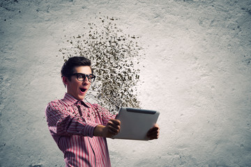 Guy using tablet pc