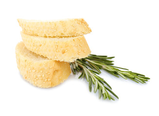 Fresh bread and rosemary isolated on white