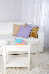 White leather sofa in room