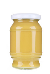 Glass jar of mustard.