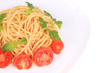 close uip of spaghetti with tomato and basil
