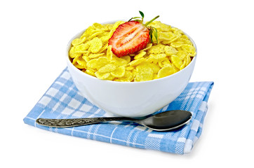 Cornflakes in bowl with strawberries