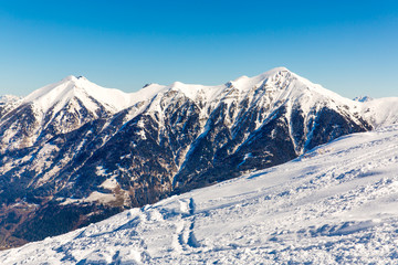 Fototapeta premium Ski resort Bad Gastein in winter snowy mountains, Austria