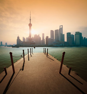 Shanghai skyline at sunrise wharf