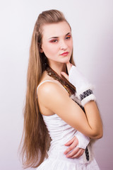 Portrait of a beautiful young woman with long hair