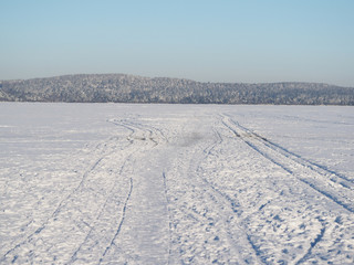 trails on the lake in winter