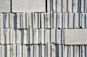 Cement bricks stacked in piles at construction site