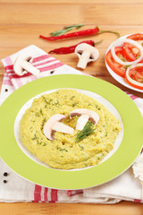 Bowl of tasty fresh hummus, close up