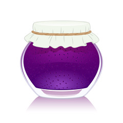 Purple blueberry or blackberry jam in glass jar.