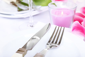 Table setting with spring flowers close up