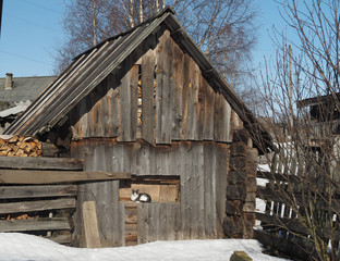 Naklejka premium Wooden house in winter village