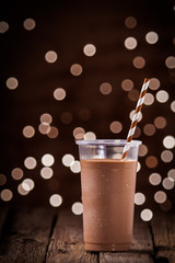 Chocolate smoothie or milkshake with party lights