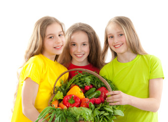 Happy children with vegetables