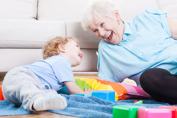 Grandmother playing with grandson