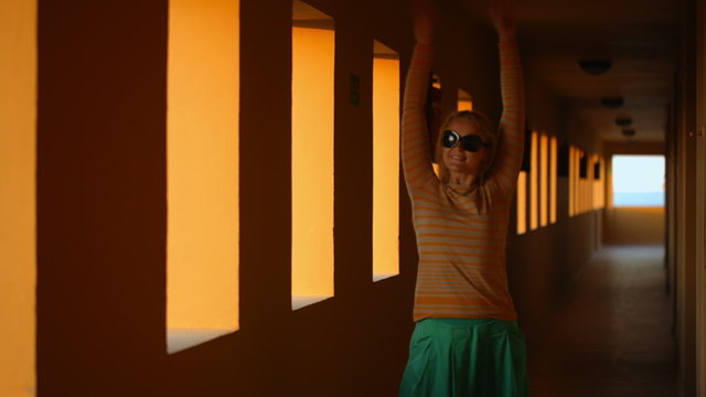 Dancing in hotel corridor