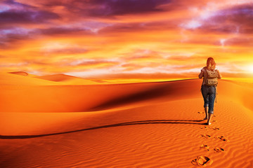 Woman traveling in the desert