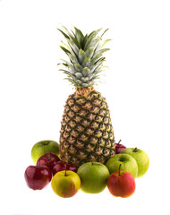 Fresh pineapple and apples on white background.