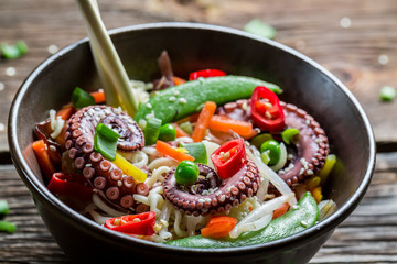Fresh vegetables with octopus and noodles