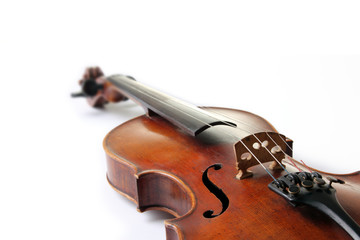 Old scratched violin on white background