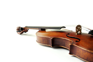 Old scratched violin on white background