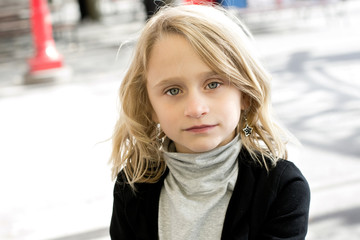 Tween girl outdoors.