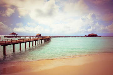 Obraz premium Island in ocean, Maldives,with a retro effect