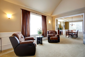 Comfortable armchairs with coffee table.