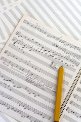 Hand written music score and pencil