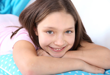 Beautiful little girl sitting